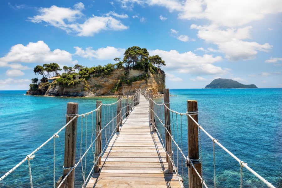 Cameo Island in Zakynthos with the shoreline and bridge seen from above